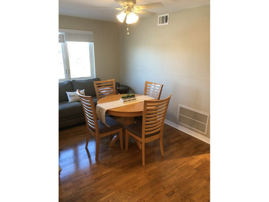 Sunlit top-floor living featuring 2 bedrooms, 1 full bath, and