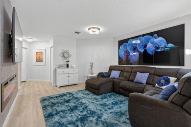 Magnificently renovated 3 bedroom, 2 full bath, 2nd floor condo