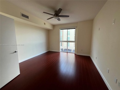 This spacious residence offers an open-concept living and dining