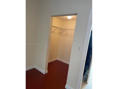 This spacious residence offers an open-concept living and dining