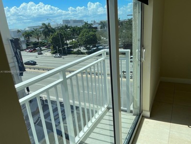 This spacious residence offers an open-concept living and dining