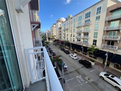 This spacious residence offers an open-concept living and dining