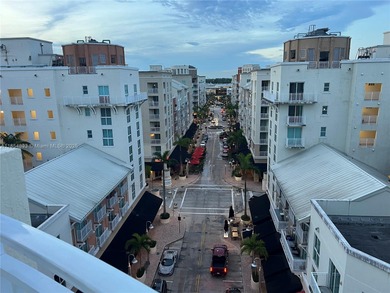 This spacious residence offers an open-concept living and dining