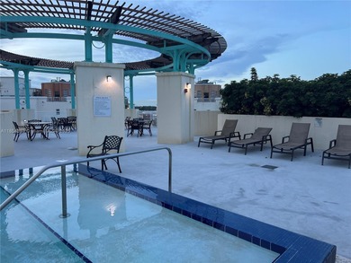 This spacious residence offers an open-concept living and dining