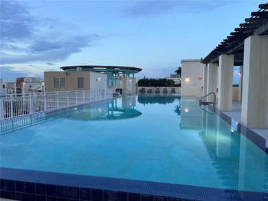 This spacious residence offers an open-concept living and dining