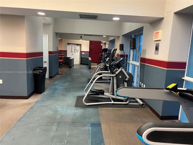 This spacious residence offers an open-concept living and dining