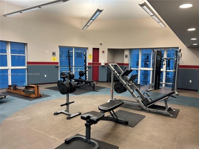 This spacious residence offers an open-concept living and dining