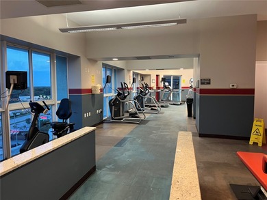 This spacious residence offers an open-concept living and dining