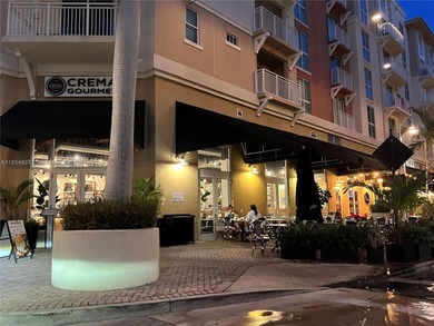 This spacious residence offers an open-concept living and dining