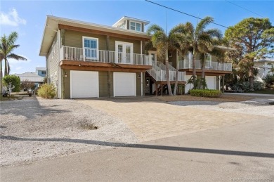 Luxury waterfront living in an exceptionally crafted, custom