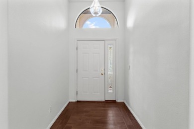 Open and airy with soaring vaulted ceilings throughout! Kitchen