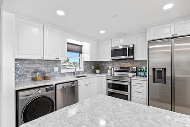 COASTAL ELEGANCE MEETS CHIC INTRACOASTAL LIVING IN THIS STUNNING