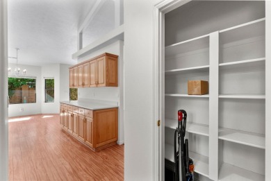 Open and airy with soaring vaulted ceilings throughout! Kitchen