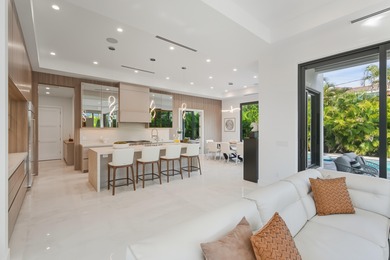 This extraordinary two-story estate is purpose-built for those