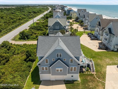 This exquisite, fully furnished oceanfront home in the coveted