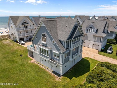 This exquisite, fully furnished oceanfront home in the coveted