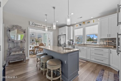 This exquisite, fully furnished oceanfront home in the coveted