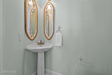 This exquisite, fully furnished oceanfront home in the coveted