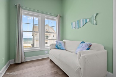 This exquisite, fully furnished oceanfront home in the coveted