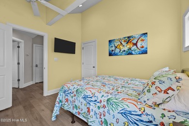 This exquisite, fully furnished oceanfront home in the coveted