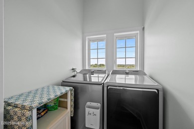 This exquisite, fully furnished oceanfront home in the coveted