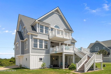 This exquisite, fully furnished oceanfront home in the coveted