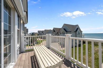 This exquisite, fully furnished oceanfront home in the coveted