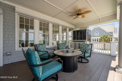 This exquisite, fully furnished oceanfront home in the coveted