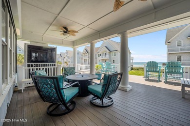 This exquisite, fully furnished oceanfront home in the coveted