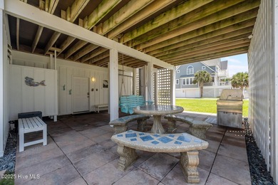 This exquisite, fully furnished oceanfront home in the coveted