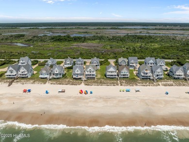 This exquisite, fully furnished oceanfront home in the coveted