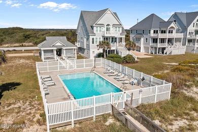 This exquisite, fully furnished oceanfront home in the coveted