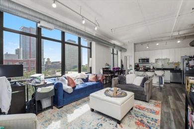 Discover this rare southeast corner unit in the 2003-built