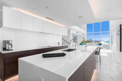 Experience modern coastal luxury in this one-of-a-kind 4-bedroom