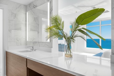 Experience modern coastal luxury in this one-of-a-kind 4-bedroom