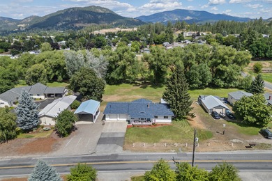 Sitting on the cov. deck, drinking a cup of coffee, watching the