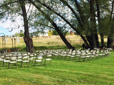 Sitting on the cov. deck, drinking a cup of coffee, watching the