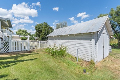 Sitting on the cov. deck, drinking a cup of coffee, watching the