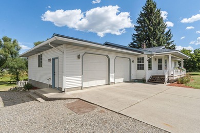 Sitting on the cov. deck, drinking a cup of coffee, watching the