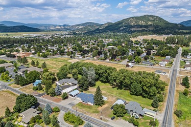 Sitting on the cov. deck, drinking a cup of coffee, watching the