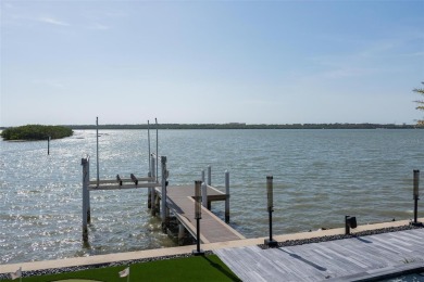 Set on a corner lot with over 200 feet of waterfront, this