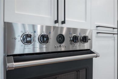 Set on a corner lot with over 200 feet of waterfront, this