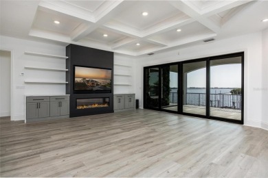 Set on a corner lot with over 200 feet of waterfront, this