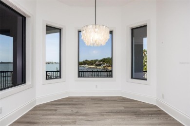 Set on a corner lot with over 200 feet of waterfront, this