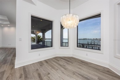 Set on a corner lot with over 200 feet of waterfront, this