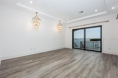 Set on a corner lot with over 200 feet of waterfront, this