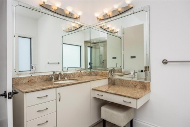 Set on a corner lot with over 200 feet of waterfront, this