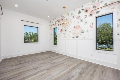 Set on a corner lot with over 200 feet of waterfront, this