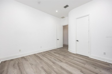 Set on a corner lot with over 200 feet of waterfront, this