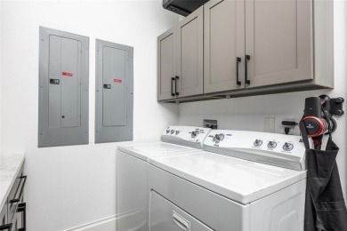 Set on a corner lot with over 200 feet of waterfront, this